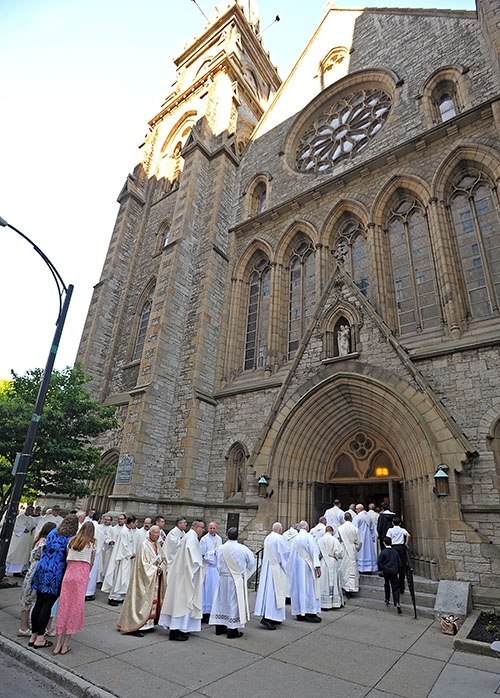 Area priests make their way into St. Joseph Cathedral for the Ordination Mass. (Dan Cappellazzo/Staff Photographer)